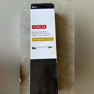 Delta glass shelf